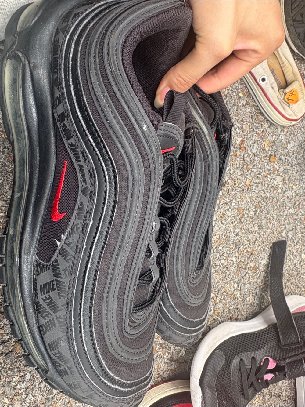 Nike Black Sneakers with Red Swoosh